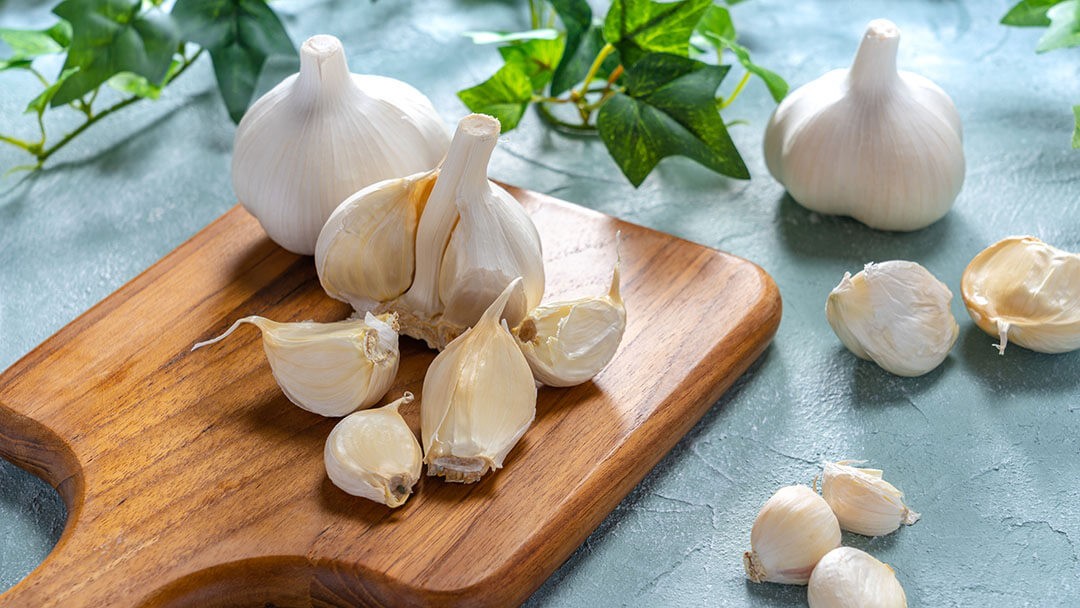 Garlic on a wooden board